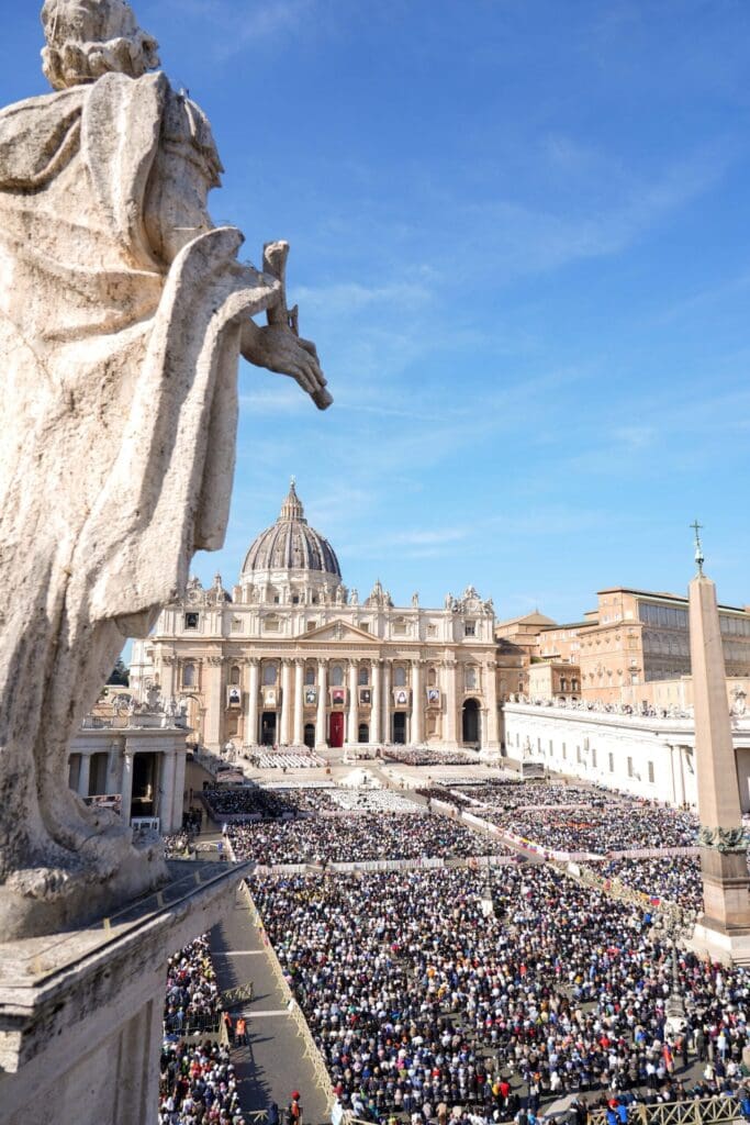 St. Peter's Square seen from above with a multitude of people.