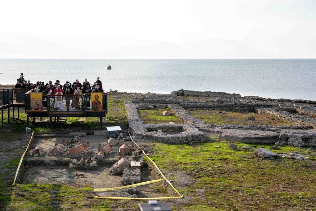 Ecumenical prayer service overlooking the ruins of an ancient basilica in Iznik.