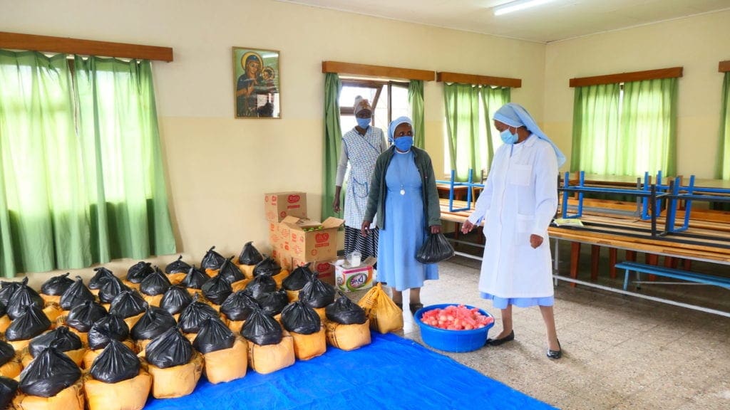 Sisters sort food packages for poor in Ethiopia