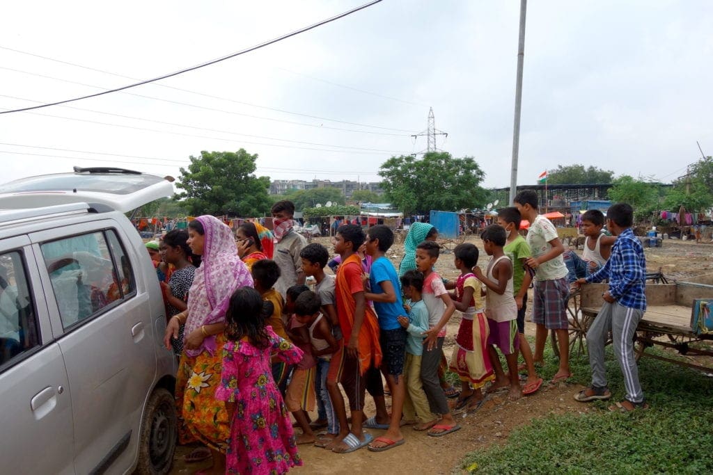 Lining up for food in India