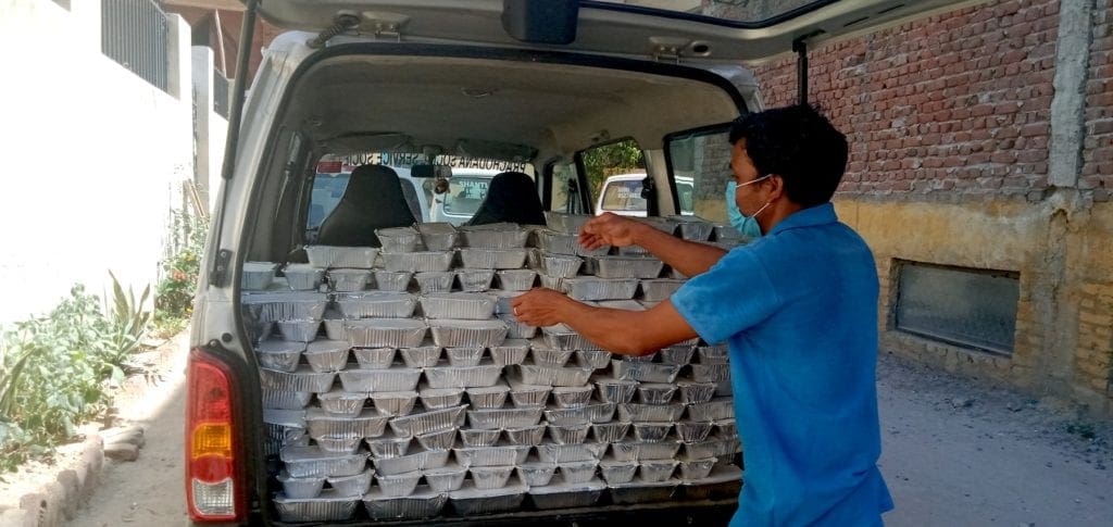 Meals are packed in car for delivery