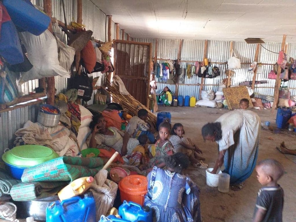 Families internally displaced by the war in Ethiopia’s Tigray region take refuge in Mai Tsebri, a town about 200 miles west of Mekelle, close the refugee camps.