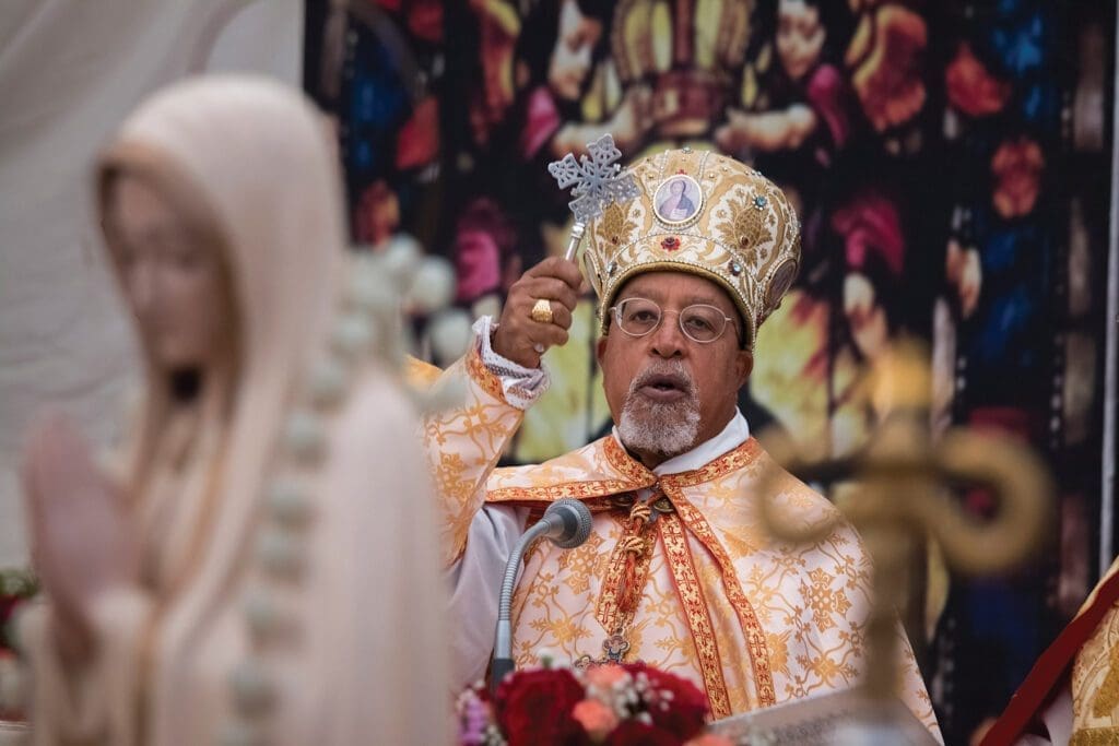 a cardinal gives a blessing during the Divine Liturgy.