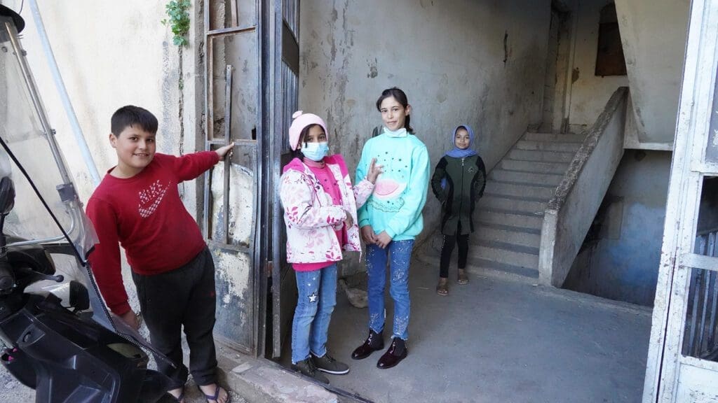 Children at a refugee camp in Dbayeh, Lebanon, are among the beneficiaries of a food box program, supported by CNEWA.