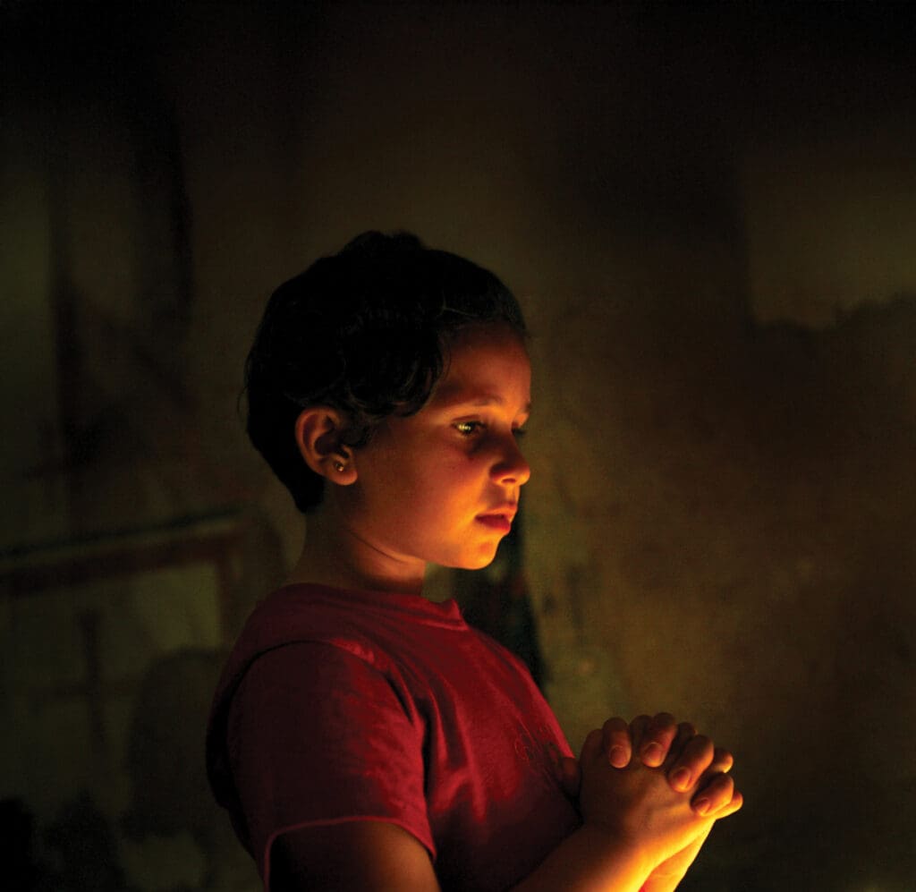 A girl praying.