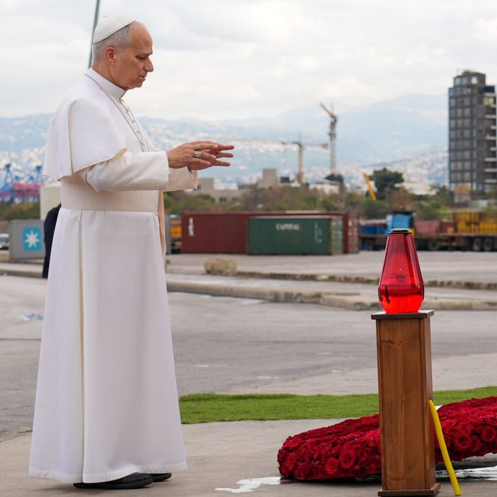 Pope Leo XIV prays at a memorial marking the site of a deadly explosion in 2020 at the port in Beirut.